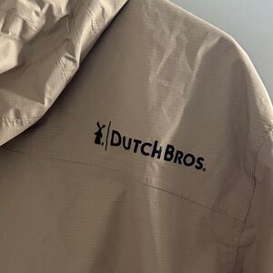 Dutch Bros Brand New Tan Lightweight Rain Jacket w Hood